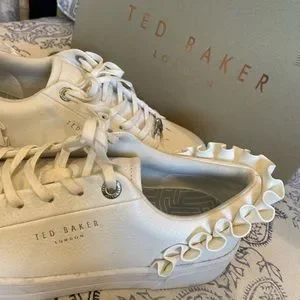 Ted baker white ruffle deals trainers
